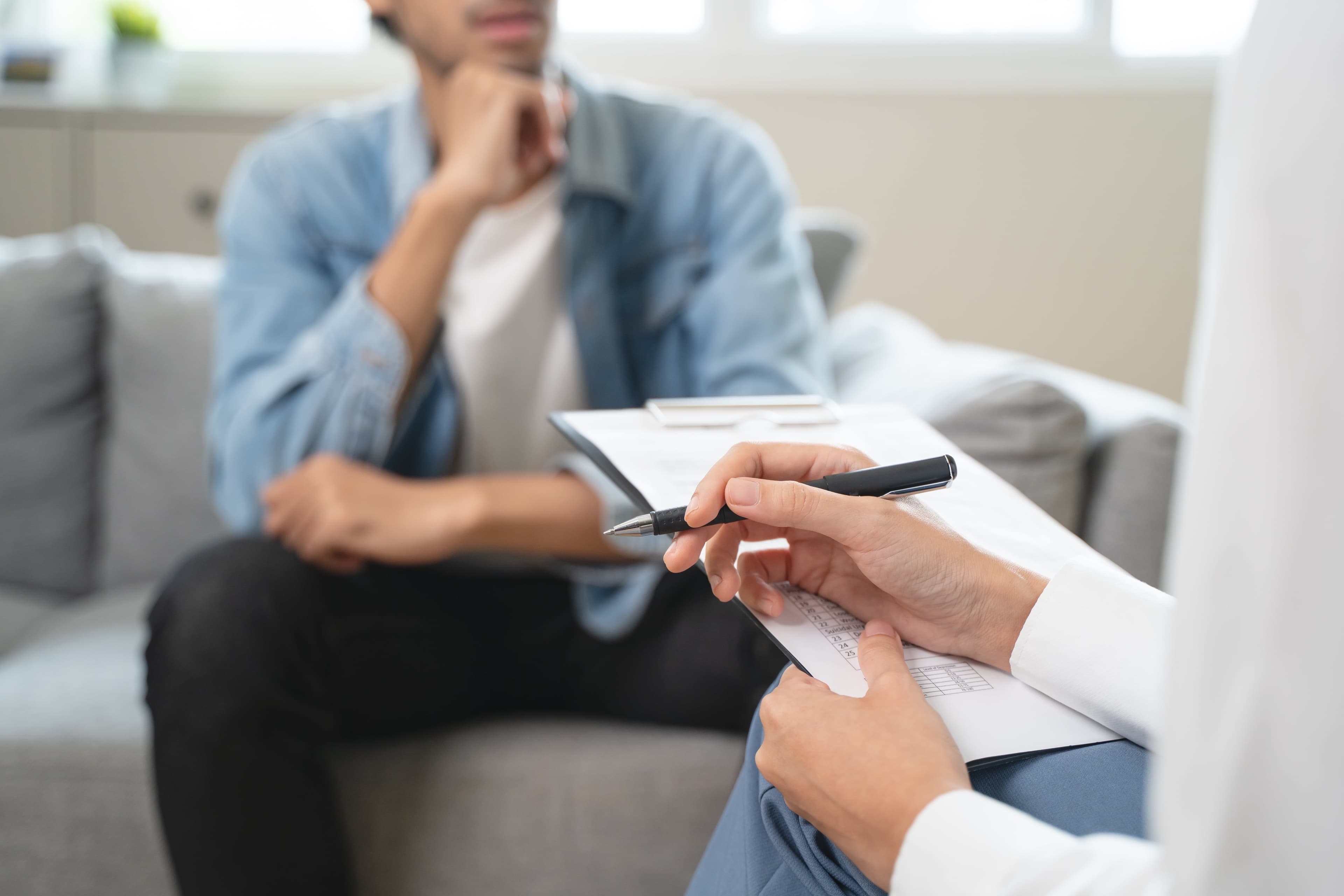 A doctor issuing a prescription for Xanax (alprazolam)